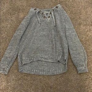 A gray knitted sweater